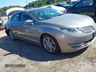2015 Lincoln MKZ z VIN 3LN6L2GKXFR621223, wystawiony jako IAAI lot #40269076 z przebiegiem 82 513 mil mil oraz . Historia ofert i sprzedaży dostępna na DreamBid. Obrazek 1.