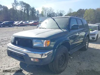 2000 Toyota 4Runner SR5 with VIN JT3HN86R6Y0305155, listed as a IAAI auction lot 41890566 with 223,502 mi miles. Bid and sale history available at carsss.com. Image 2.
