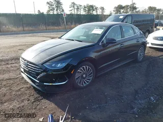 2021 Hyundai Sonata Hybrid SEL with VIN KMHL34JJ1MA027058, listed as a IAAI auction lot 41187431 with 39,437 mi miles. Bid and sale history available at carsss.com. Image 23.