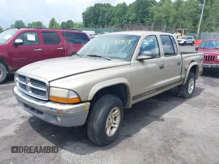 2004 Dodge Dakota SLT with VIN 1D7HG48N54S720724, listed as a IAAI auction lot 42740246 with 153,504 mi miles and . Bid and sale history available at DreamBid. Image 2.