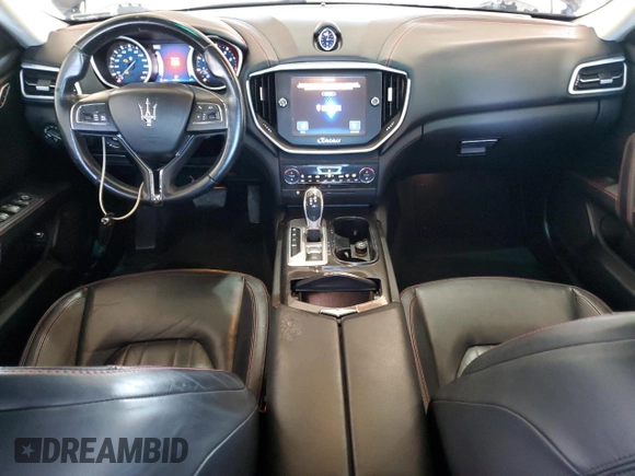 2015 Maserati Ghibli z VIN ZAM57XSA2F1159438, wystawiony jako Copart lot #52530965 z przebiegiem 73 996 mil mil oraz Szkoda całkowita • Salvage title. Historia ofert i sprzedaży dostępna na DreamBid. Obrazek 8.