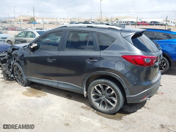 2016 Mazda CX-5 Grand Touring with VIN JM3KE4DY7G0643643, listed as a IAAI auction lot 42077497 with 120,343 mi miles. Bid and sale history available at carsss.com. Image 14.