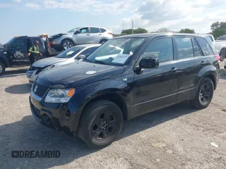 2008 Suzuki Grand Vitara with VIN JS3TE941284102380, listed as a IAAI auction lot 42061609 with 103,554 mi miles and . Bid and sale history available at DreamBid. Image 2.