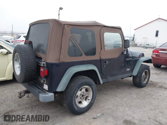1998 Jeep Wrangler SE with VIN 1J4FY29P9WP792089, listed as a IAAI auction lot 41794793 with 200,838 mi miles. Bid and sale history available at carsss.com. Image 4.
