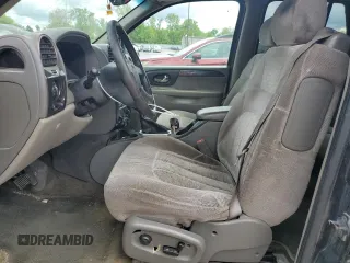 2003 GMC Envoy SLE z VIN 1GKDT13S432160651, wystawiony jako Copart lot #56938205 z przebiegiem 197 593 mil mil oraz Szkoda całkowita • Salvage title. Historia ofert i sprzedaży dostępna na DreamBid. Obrazek 7.