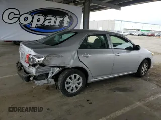 2010 Toyota Corolla with VIN 1NXBU4EE1AZ206765, listed as a Copart auction lot 60996215 with 196,623 mi miles and Salvage title. Bid and sale history available at DreamBid. Image 3.