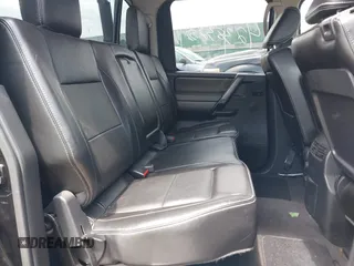 2013 Nissan Titan SV with VIN 1N6AA0EC4DN302479, listed as a IAAI auction lot 42383255 with 112,991 mi miles and . Bid and sale history available at DreamBid. Image 8.