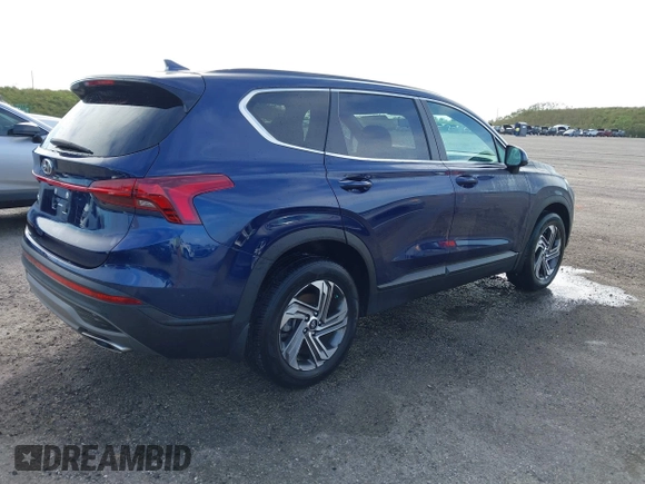 2022 Hyundai Santa Fe SE with VIN 5NMS14AJ6NH449145, listed as a IAAI auction lot 40491612 with 21,488 mi miles and . Bid and sale history available at DreamBid. Image 4.