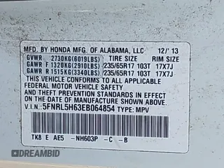 2014 Honda Odyssey EX-L with VIN 5FNRL5H63EB064854, listed as a IAAI auction lot 42102704 with 148,536 mi miles and . Bid and sale history available at carsss.com. Image 9.
