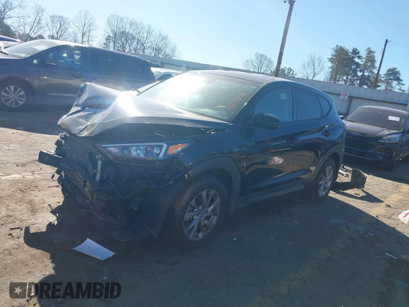 2021 Hyundai Tucson SE with VIN KM8J23A40MU334847, listed as a IAAI auction lot 41817556 with 63,000 mi miles and . Bid and sale history available at DreamBid. Image 17.