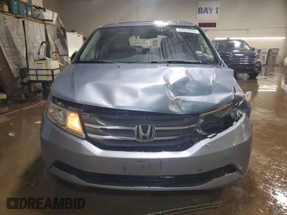 2013 Honda Odyssey EX-L with VIN 5FNRL5H64DB080141, listed as a Copart auction lot 49553235 with 128,358 mi miles and Salvage Title. Bid and sale history available at carsss.com. Image 5.