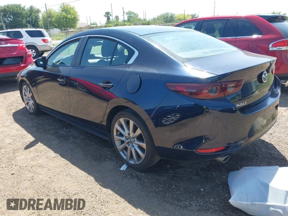 2021 Mazda 3 Select with VIN JM1BPABL7M1314973, listed as a IAAI auction lot 42011342 with 53,785 mi miles and . Bid and sale history available at DreamBid. Image 3.