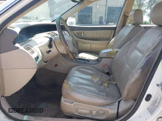 2001 Toyota Avalon XL z VIN 4T1BF28B51U168456, wystawiony jako IAAI lot #42093996 z przebiegiem 276 229 mil mil oraz . Historia ofert i sprzedaży dostępna na DreamBid. Obrazek 5.