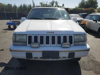 1995 Jeep Grand Cherokee Limited z VIN 1J4GZ78S0SC575083, wystawiony jako Copart lot #61047975 z przebiegiem 205 407 mil mil oraz Czysty tytuł • Clean title. Historia ofert i sprzedaży dostępna na DreamBid. Obrazek 5.