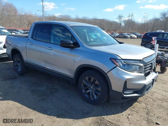 2021 Honda Ridgeline Sport with VIN 5FPYK3F10MB003879, listed as a IAAI auction lot 41677509 with 36,804 mi miles. Bid and sale history available at carsss.com. Image 1.