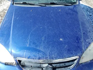 2006 Suzuki Forenza z VIN KL5JD56Z56K349704, wystawiony jako Copart lot #44724515 z przebiegiem Nie podano mil oraz Szkoda całkowita • Salvage title. Historia ofert i sprzedaży dostępna na DreamBid. Obrazek 11.