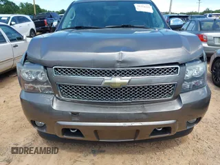 2011 Chevrolet Suburban LTZ with VIN 1GNSKKE3XBR394436, listed as a IAAI auction lot 42324225 with 132,871 mi miles and . Bid and sale history available at DreamBid. Image 6.