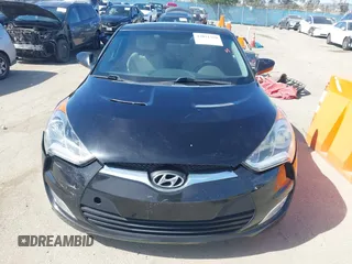 2013 Hyundai Veloster w/Black Int with VIN KMHTC6AD4DU132701, listed as a IAAI auction lot 42021759 with 102,840 mi miles and . Bid and sale history available at DreamBid. Image 12.