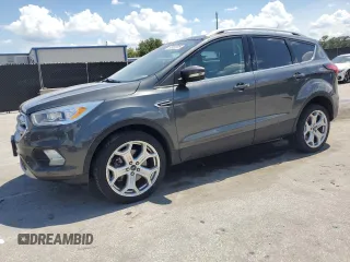 2019 Ford Escape Titanium with VIN 1FMCU9J96KUA65154, listed as a Copart auction lot 63932325 with 117,963 mi miles and Clean title. Bid and sale history available at DreamBid. Image 1.