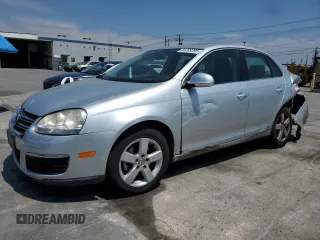 2009 Volkswagen Jetta SE с VIN 3VWRZ71K49M090833, выставлен на аукционе Copart как лот 55309295 с пробегом 76 874 миль миль и Списание • Salvage title. История ставок и продаж доступна на DreamBid. Изображение 1.