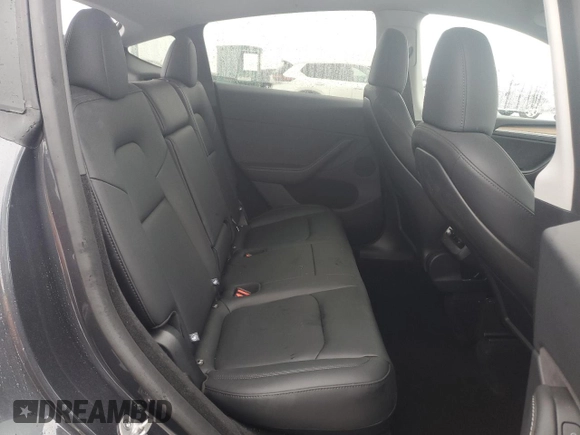 2024 Tesla Model Y with VIN 7SAYGDED1RA321691, listed as a Copart auction lot 52153945 with 7,544 mi miles and Salvage Title. Bid and sale history available at DreamBid. Image 10.