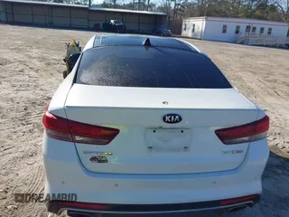 2016 Kia Optima SX Turbo with VIN 5XXGW4L2XGG084628, listed as a IAAI auction lot 41668592 with 116,535 mi miles and . Bid and sale history available at carsss.com. Image 16.