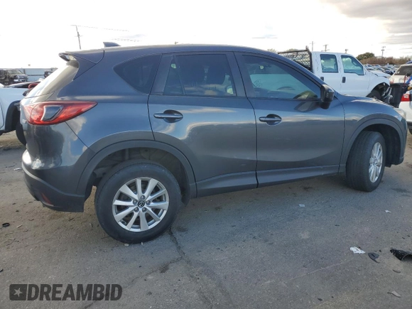 2015 Mazda CX-5 Sport with VIN JM3KE4BE0F0441203, listed as a Copart auction lot 79968514 with 134,890 mi miles and Salvage title. Bid and sale history available at DreamBid. Image 3.