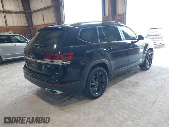 2022 Volkswagen Atlas SE with VIN 1V2KP2CA5NC509929, listed as a IAAI auction lot 42231410 with 84,678 mi miles and . Bid and sale history available at DreamBid. Image 4.