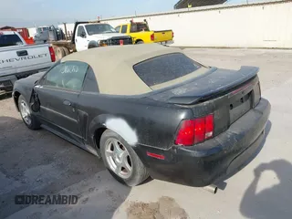 2004 Ford Mustang Deluxe with VIN 1FAFP44624F133914, listed as a IAAI auction lot 41699614 with 170,650 mi miles. Bid and sale history available at carsss.com. Image 3.