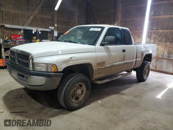 2002 Dodge 2500 z VIN 3B7KF236X2M256911, wystawiony jako Copart lot #51001775 z przebiegiem 208 199 mil mil oraz Tytuł czysty. Historia ofert i sprzedaży dostępna na DreamBid. Obrazek 1.