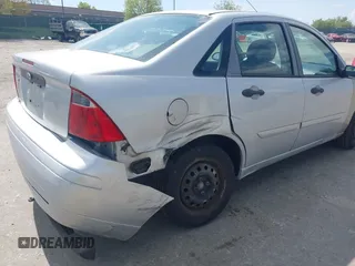 2007 Ford Focus S with VIN 1FAFP34N37W309603, listed as a IAAI auction lot 42050142 with 87,371 mi miles and . Bid and sale history available at carsss.com. Image 6.