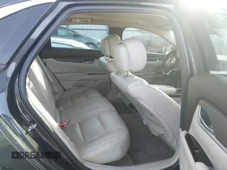 2013 Cadillac XTS with VIN 2G61N5S34D9231315, listed as a IAAI auction lot 41092660 with 206,093 mi miles. Bid and sale history available at carsss.com. Image 8.