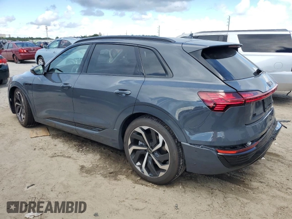 2024 Audi Q8 e-tron Premium Plus z VIN WA15AAGE0RB060883, wystawiony jako Copart lot #69075094 z przebiegiem 1 583 mil mil oraz Szkoda całkowita • Salvage title. Historia ofert i sprzedaży dostępna na DreamBid. Obrazek 2.