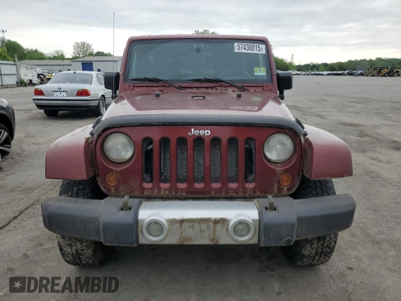 2008 Jeep Wrangler Unlimited Sahara z VIN 1J8GA59108L648333, wystawiony jako Copart lot #57430015 z przebiegiem 506 770 mil mil oraz Czysty tytuł • Clean title. Historia ofert i sprzedaży dostępna na DreamBid. Obrazek 5.