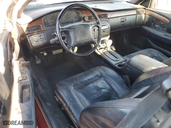 1999 Cadillac Eldorado with VIN 1G6EL12Y3XU606176, listed as a Copart auction lot 76889424 with 126,198 mi miles and Salvage Title. Bid and sale history available at carsss.com. Image 8.