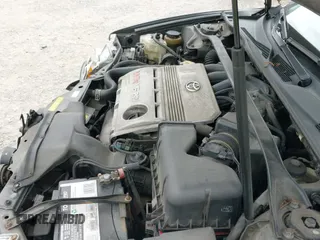 2004 Toyota Camry LE with VIN 4T1BF32K64U574765, listed as a IAAI auction lot 42695649 with 187,526 mi miles and . Bid and sale history available at DreamBid. Image 19.