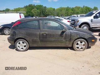 2006 Ford Focus S z VIN 1FAFP31N76W249134, wystawiony jako IAAI lot #41951073 z przebiegiem 152 065 mil mil oraz . Historia ofert i sprzedaży dostępna na DreamBid. Obrazek 13.