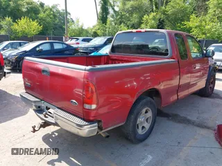 1999 Ford F-150 with VIN 1FTZX1725XKA41044, listed as a IAAI auction lot 42446146 with Not provided miles and . Bid and sale history available at DreamBid. Image 4.