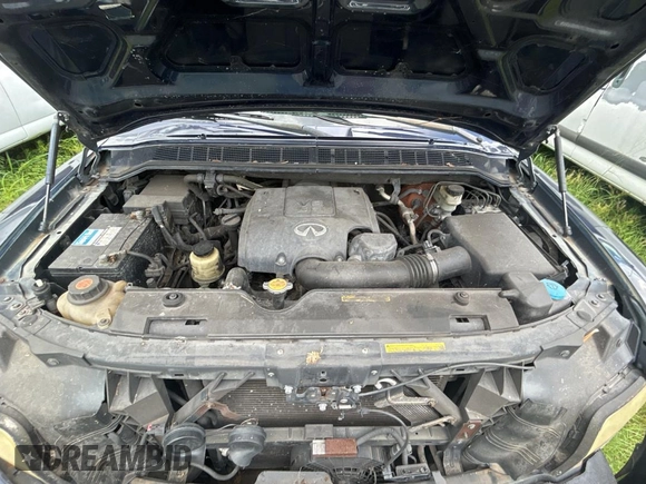 2007 Infiniti QX56 z VIN 5N3AA08A47N804400, wystawiony jako Copart lot #59031335 z przebiegiem 202 776 mil mil oraz Czysty tytuł • Clean title. Historia ofert i sprzedaży dostępna na DreamBid. Obrazek 7.