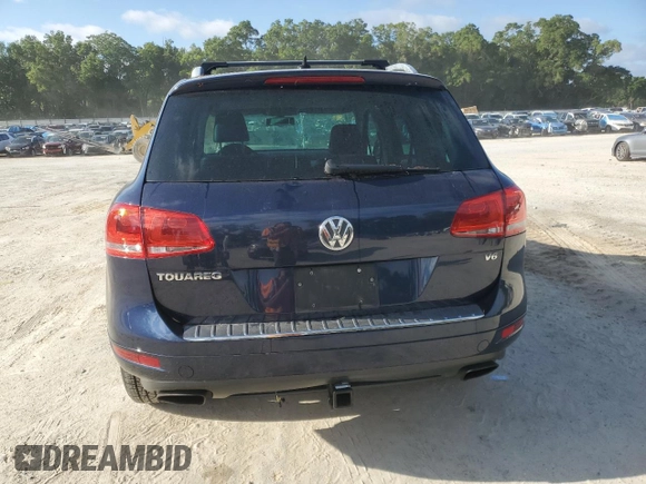 2014 Volkswagen Touareg Sport with VIN WVGEF9BP0ED005648, listed as a Copart auction lot 53230315 with 188,103 mi miles and Clean Title. Bid and sale history available at DreamBid. Image 6.
