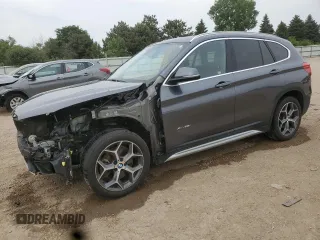2017 BMW X1 xDrive28i with VIN WBXHT3Z3XH4A53999, listed as a Copart auction lot 60500265 with 43,377 mi miles and Salvage title. Bid and sale history available at DreamBid. Image 1.