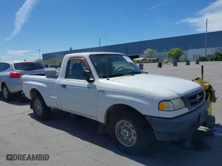 2003 Mazda B-Series 2WD Truck SX with VIN 4F4YR12D53TM11564, listed as a IAAI auction lot 42028399 with 218,402 mi miles. Bid and sale history available at carsss.com. Image 6.