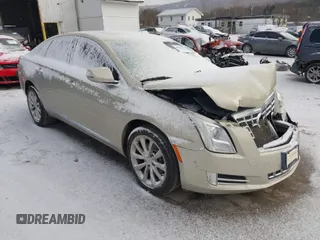 2014 Cadillac XTS Luxury with VIN 2G61M5S37E9304598, listed as a IAAI auction lot 41006051 with 115,879 mi miles. Bid and sale history available at carsss.com. Image 1.