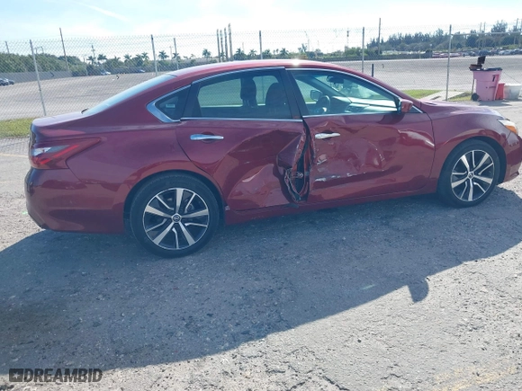 2018 Nissan Altima 2.5 SL with VIN 1N4AL3AP9JC133645, listed as a IAAI auction lot 41278236 with 81,605 mi miles. Bid and sale history available at carsss.com. Image 4.
