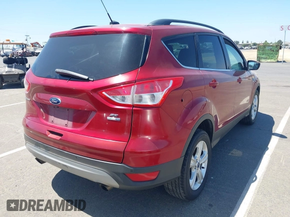 2014 Ford Escape SE z VIN 1FMCU9GX3EUB64623, wystawiony jako IAAI lot #42560923 z przebiegiem 120 730 mil mil oraz . Historia ofert i sprzedaży dostępna na DreamBid. Obrazek 4.