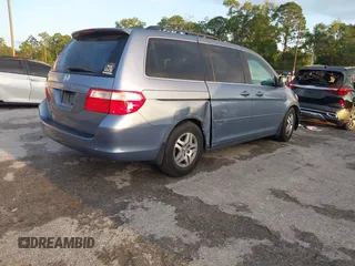 2007 Honda Odyssey EX-L z VIN 5FNRL38717B035384, wystawiony jako IAAI lot #41976861 z przebiegiem 211 640 mil mil oraz . Historia ofert i sprzedaży dostępna na DreamBid. Obrazek 4.