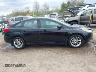 2016 Ford Focus SE with VIN 1FADP3F26GL280805, listed as a IAAI auction lot 42031492 with 146,986 mi miles. Bid and sale history available at carsss.com. Image 13.