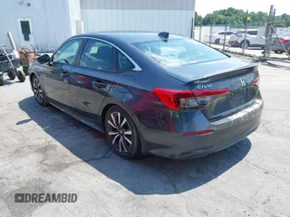 2023 Honda Civic EX with VIN 2HGFE1F75PH302414, listed as a IAAI auction lot 42680807 with 49,520 mi miles and . Bid and sale history available at DreamBid. Image 3.