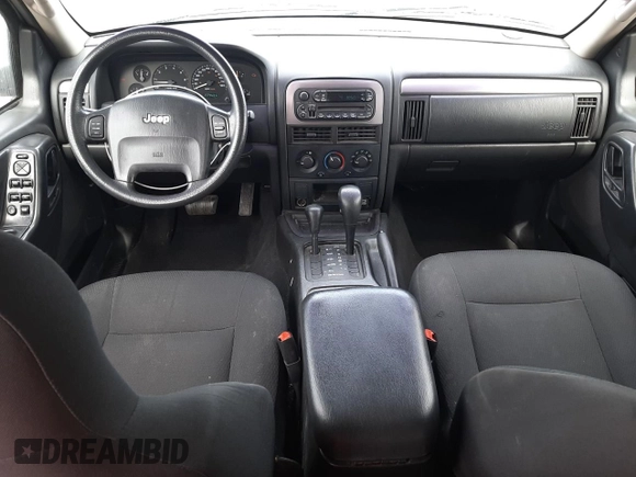 2004 Jeep Grand Cherokee Laredo with VIN 1J4GW48S34C339876, listed as a Copart auction lot 52428045 with 229,606 mi miles and Salvage Title. Bid and sale history available at carsss.com. Image 8.