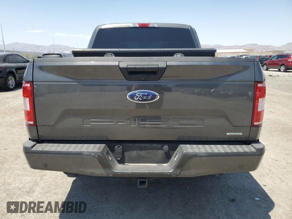 2018 Ford F-150 XL with VIN 1FTEW1CG6JKF80184, listed as a Copart auction lot 62591095 with 60,929 mi miles and Salvage title. Bid and sale history available at DreamBid. Image 6.